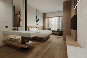 Voodi või voodid majutusasutuse Fairfield by Marriott Quanzhou Fengze toas