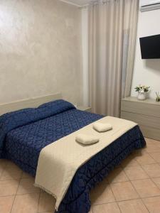 En eller flere senge i et værelse på Calafuria