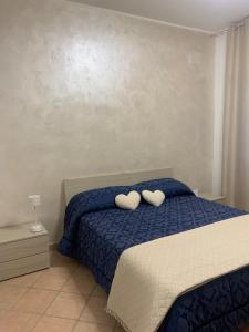 En eller flere senge i et værelse på Calafuria