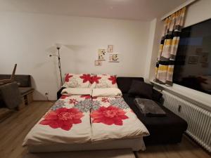 a small room with a bed and a couch at Stilvolles Panorama-Appartement in Zirkitz +27 photos