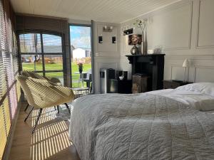 Katil atau katil-katil dalam bilik di Simmerwille B&B- Camping- Bootverhuur