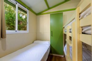 Postel nebo postele na pokoji v ubytování Camping Paloma