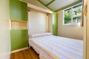 Postel nebo postele na pokoji v ubytování Camping Paloma