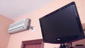 TV a/nebo společenská místnost v ubytování Hotel Riavela