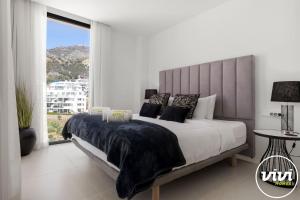 Ένα ή περισσότερα κρεβάτια σε δωμάτιο στο ViVi Homes - Casa Española