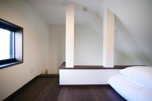 Ένα ή περισσότερα κρεβάτια σε δωμάτιο στο Close to Station, Quiet Area, Central Shinjuku, Room 203