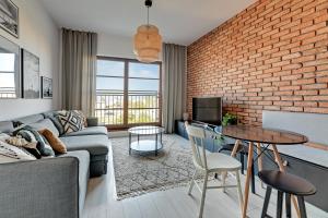 Χώρος καθιστικού στο Nowa Motława SPA, Pool, Gym by Downtown Apartments