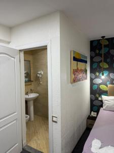 Koupelna v ubytování Garden Inn by NHG