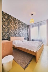 Postel nebo postele na pokoji v ubytování Hostel Prazacka