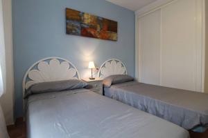 Postel nebo postele na pokoji v ubytování Apartamento Cortes Altea