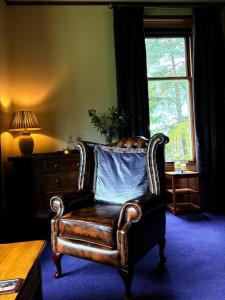 Posezení v ubytování Dalrachney Lodge
