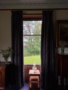 Posezení v ubytování Dalrachney Lodge
