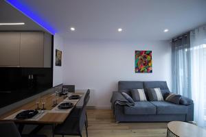 Χώρος καθιστικού στο Apartamento Moderno a 5 min del Funicamp, 1-2