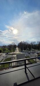 a view of a parking lot from a balcony at Penthouse in Nowy Sącz