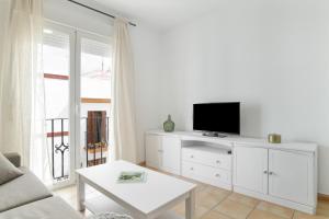 Telewizja i/lub zestaw kina domowego w obiekcie Apartamento Perez Zara 7