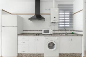 Kuchnia lub aneks kuchenny w obiekcie Apartamento Perez Zara 7