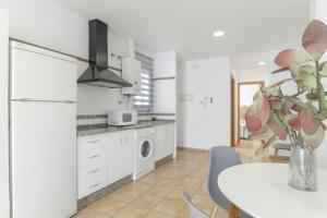 Kuchnia lub aneks kuchenny w obiekcie Apartamento Perez Zara 7