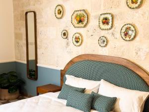 Letto o letti in una camera di Il Bekka Suites