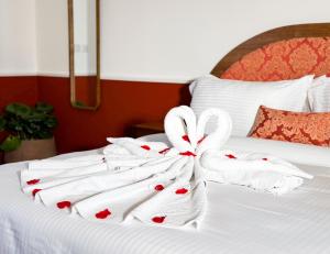 Letto o letti in una camera di Il Bekka Suites