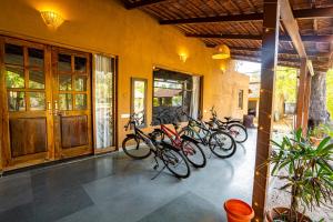 a group of bikes parked in a building at Mahua Vann Pench in Khawāsa