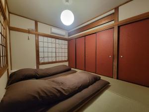 Voodi või voodid majutusasutuse 華の宿 toas