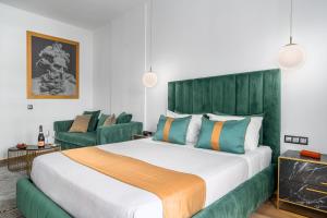 Posteľ alebo postele v izbe v ubytovaní MR P. Boutique Residence