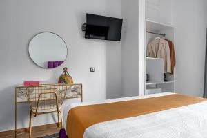 Posteľ alebo postele v izbe v ubytovaní MR P. Boutique Residence