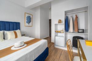 Posteľ alebo postele v izbe v ubytovaní MR P. Boutique Residence