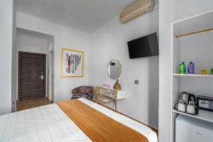 Posteľ alebo postele v izbe v ubytovaní MR P. Boutique Residence