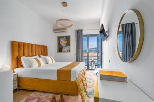 Posteľ alebo postele v izbe v ubytovaní MR P. Boutique Residence