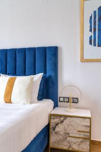 Posteľ alebo postele v izbe v ubytovaní MR P. Boutique Residence