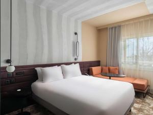 Postel nebo postele na pokoji v ubytování Novotel Cairo 6th Of October + 37 fotografií
