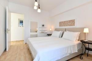 Posteľ alebo postele v izbe v ubytovaní DreamCatcher Sea view mini pool Paros