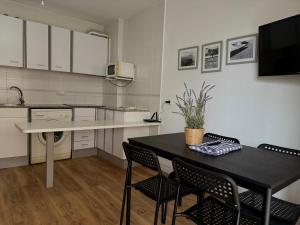 Kuchyňa alebo kuchynka v ubytovaní Apartamentos Amatista