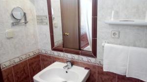 Koupelna v ubytování Hotel Riavela