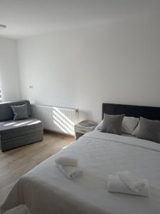 Voodi või voodid majutusasutuse Apartmani Hilston toas