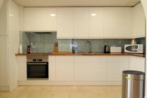 O bucătărie sau chicinetă la Apartamento Playa y Centro Albir