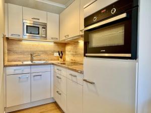 Kuchyň nebo kuchyňský kout v ubytování Fewo 675, Seepark Sellin