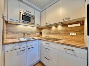 Kuchyň nebo kuchyňský kout v ubytování Fewo 675, Seepark Sellin