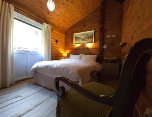 Postel nebo postele na pokoji v ubytování Stravaigin Lodges