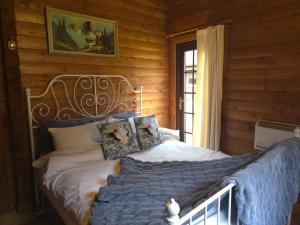 Postel nebo postele na pokoji v ubytování Stravaigin Lodges