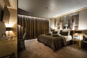 Postel nebo postele na pokoji v ubytování Thermen Londerzeel Hotel