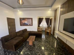 Televisyen dan/atau pusat hiburan di Presken Hotel and Resorts MOJIDI