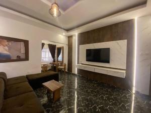 TV a/nebo společenská místnost v ubytování Presken Hotel and Resorts MOJIDI + 13 fotografií