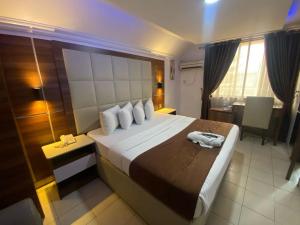 Katil atau katil-katil dalam bilik di Presken Hotel and Resorts MOJIDI