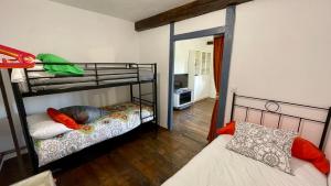 Postel nebo postele na pokoji v ubytování Casa Los Nogales de Ibio