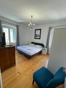 Postel nebo postele na pokoji v ubytování Apartments and Rooms Ille
