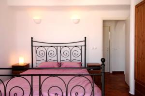 Postel nebo postele na pokoji v ubytování Divers Cycladic House Paros