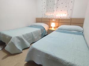 Postel nebo postele na pokoji v ubytování APCOSTAS Torremar - Oropesa + 37 fotografií