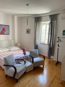 Postel nebo postele na pokoji v ubytování Apartments and Rooms Ille
